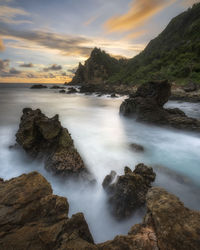 Scenic view of sea against sky during sunset