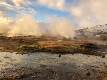 Scenic view of land against sky