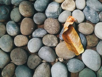 Close-up of pebbles on beach