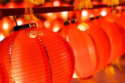 Close-up of illuminated lanterns