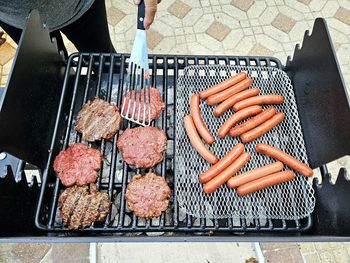 High angle view of food on barbecue grill