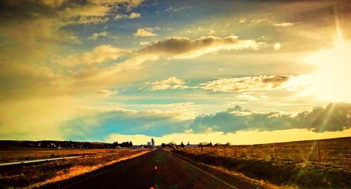 Road against sky during sunset