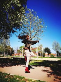 Girl jumping in park