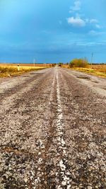 Surface level of road against sky