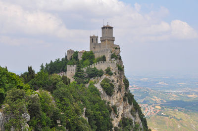 Panoramic view of old ruins against sky