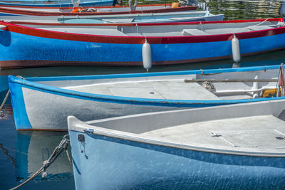 Boats moored in water
