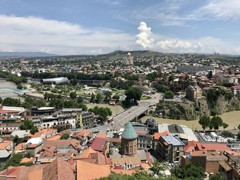 High angle shot of townscape against sky