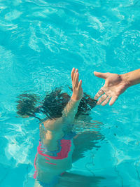 Woman swimming in pool