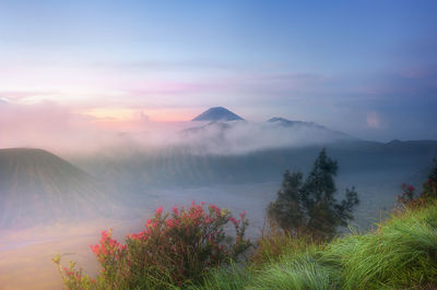 Scenic view of mountains against sky during sunset