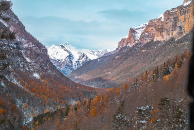 View of mountain range against cloudy sky