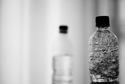 Close-up of water bottle against blurred background