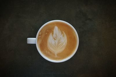 High angle view of cappuccino on table