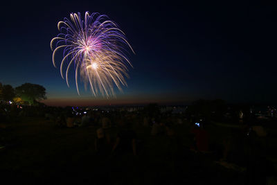 Firework display at night