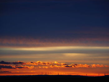 Scenic view of dramatic sky during sunrice