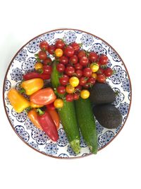 High angle view of fruits in plate on table