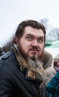 Man standing outdoors during winter