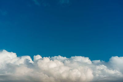 Low angle view of clouds in blue sky