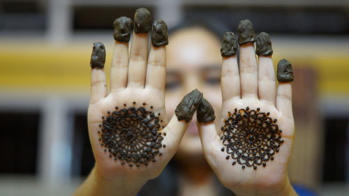 Close-up of hand with mehndi