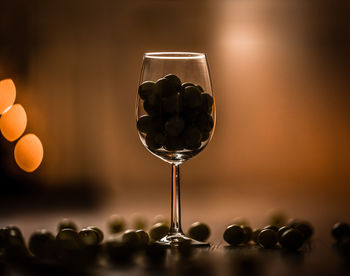 Close-up of food in wineglass on table