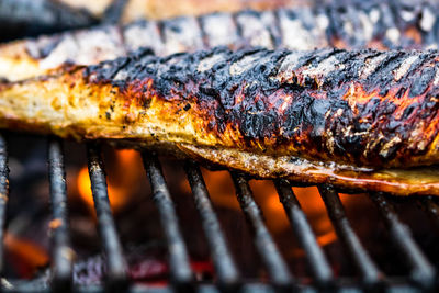 Close-up of meat on barbecue grill