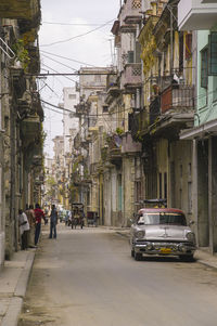 People walking on street in city