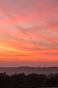 Scenic view of dramatic sky during sunset