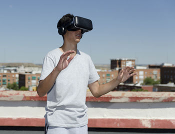 Virtual reality experience young man having a funny moment