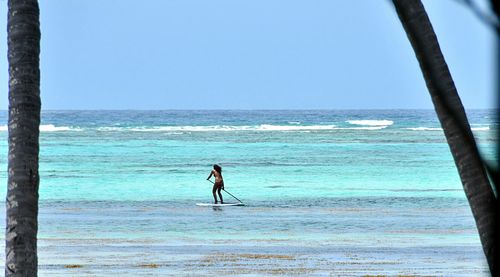 Scenic view of sea against clear sky