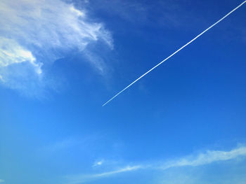 Low angle view of vapor trail in sky