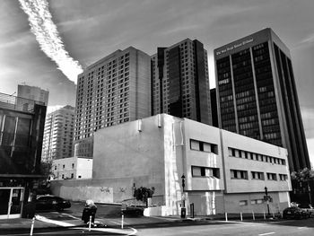 Modern buildings against sky in city