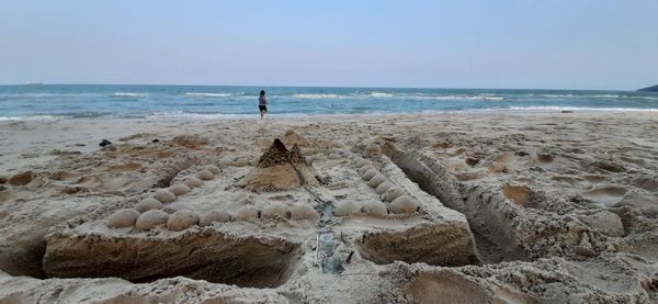 Scenic view of beach against sky