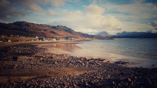 Scenic view of sea against sky at sunset