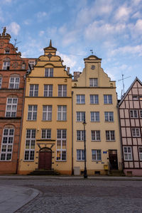 Low angle view of buildings against sky