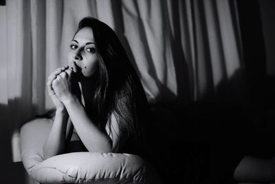 Portrait of beautiful woman at home