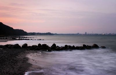 Scenic view of sea at sunset