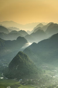 Scenic view of mountains against sky during sunset