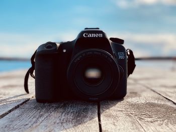 Close-up of camera on table