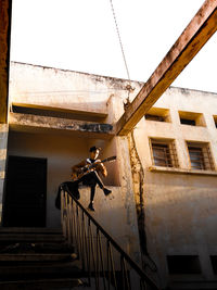 Low angle view of guitarist 