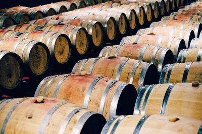 Full frame shot of wine casks in cellar