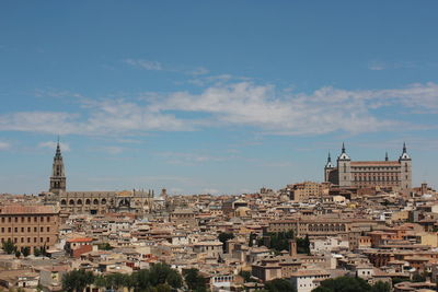 High angle view of houses and buildings in city