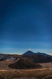 Scenic view of volcanic crater against sky