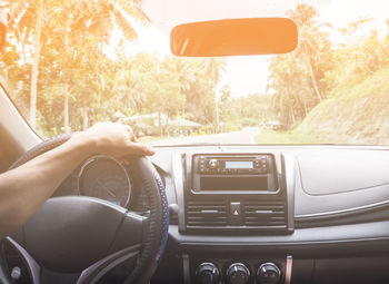 Close-up of man driving car