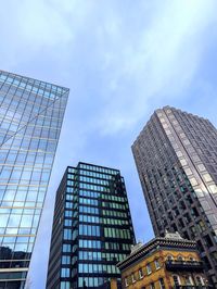 Low angle view of skyscraper against sky