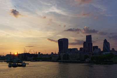 View of harbor at sunset