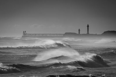 Scenic view of sea against sky whitby rough seas