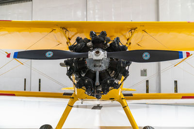 Close-up of jet engine at airplane hangar