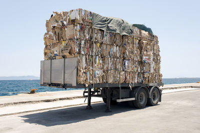 A view of a truck with recycled papers and cardboards in the customs of kos, greece