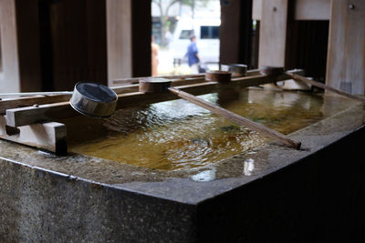 Close-up of japanese shrine water fountain