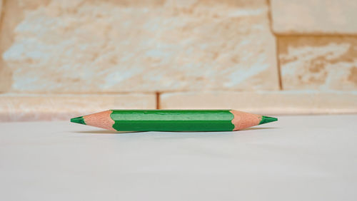 Close-up of colored pencils on table