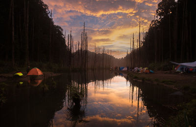 Scenic view of lake against sky during sunset